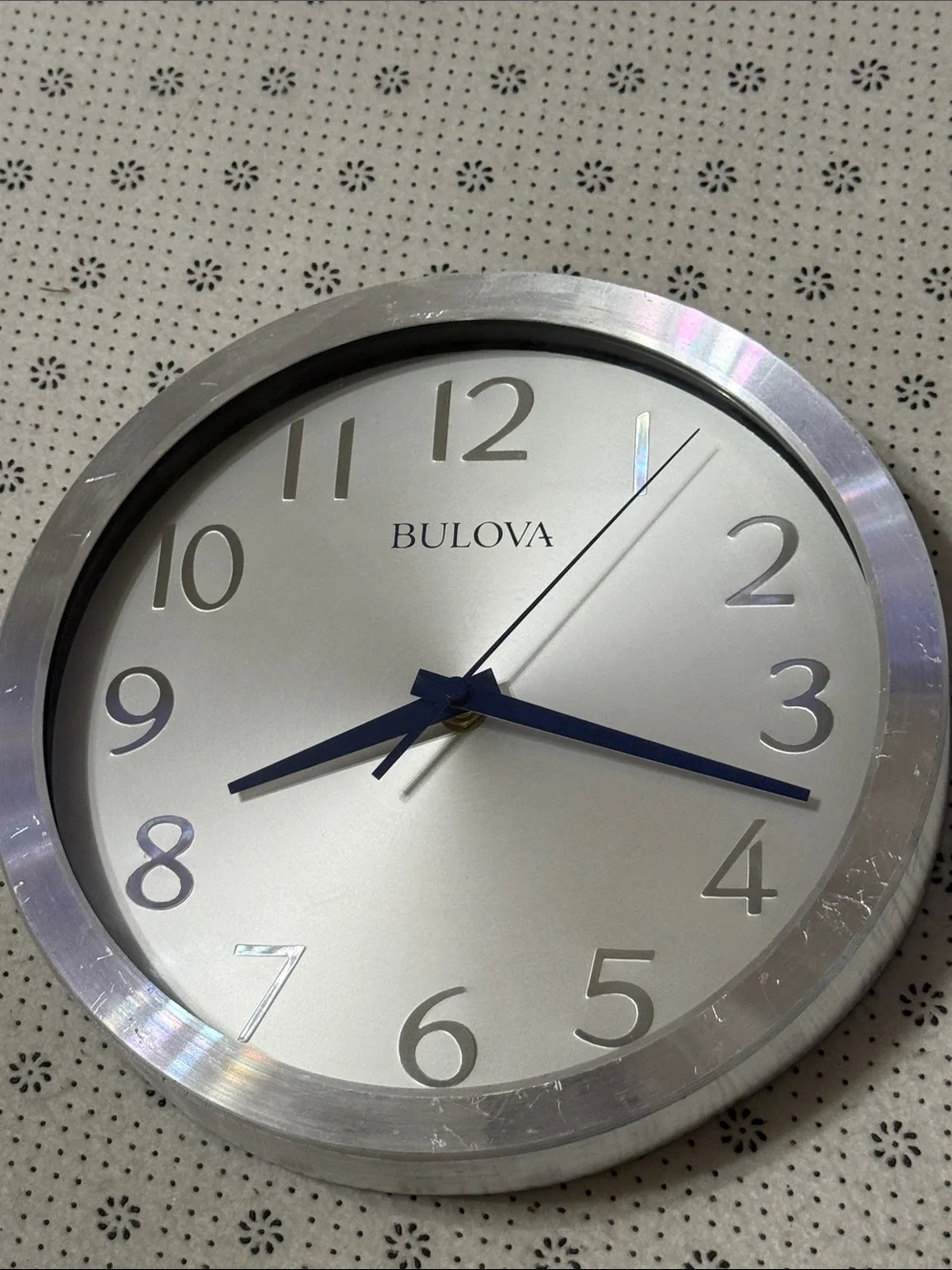Bulova Silver Wall Clock with Blue Hands and Silver Dial
